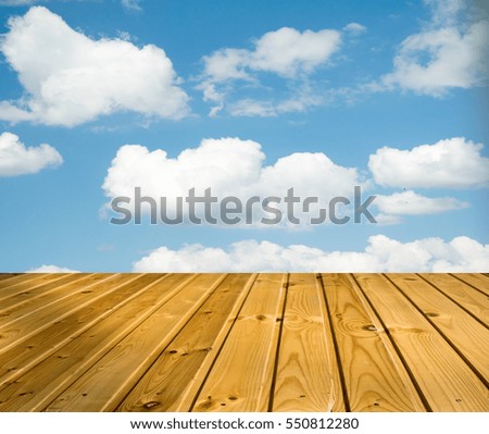blue sky clouds with wooden walkway