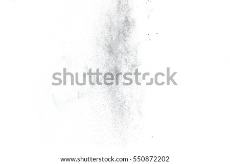 The black powder splattered on white background, Abstract black particle background. Holiday texture.