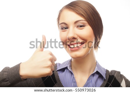 Happy businesswoman making an ok sign