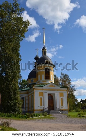 Church on a background of blue sky with clouds