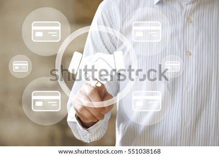 Businessman pushing button handshake credit card business network