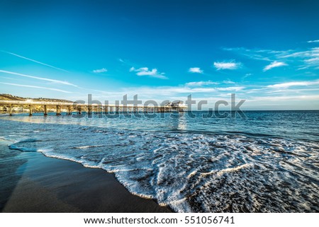 Malibu pier on a clear day, California Royalty-Free Stock Photo #551056741