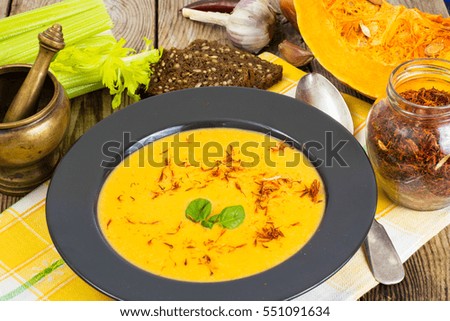 Diet food.Pumpkin puree with saffron. Studio Photo
