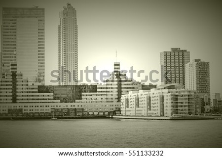 Architecture of famous skyscraper buildings in New York City. NYC powerful city of USA, panorama with Skyline over Hudson River for travel concept business, postcards. Image with retro filter effect 