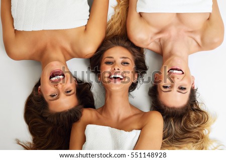 Picture showing group of happy friends in spa Royalty-Free Stock Photo #551148928