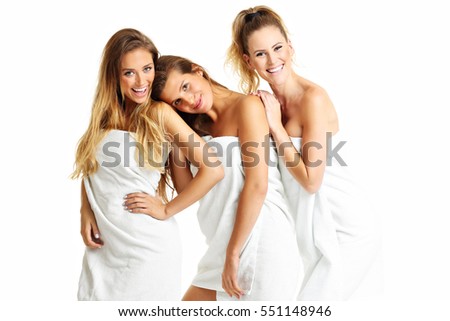 Picture showing group of friends in towels