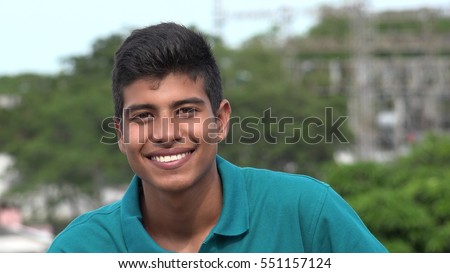 Confident Happy Smiling Teen Hispanic Boy Royalty-Free Stock Photo #551157124