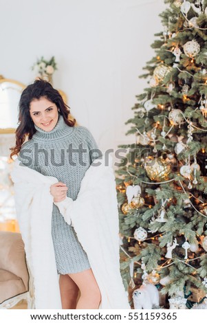 Happy women in Christmas decorations