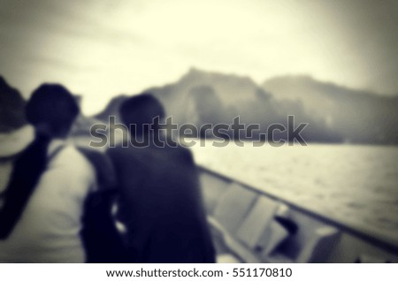 Blurred abstract background of couple travel on boat