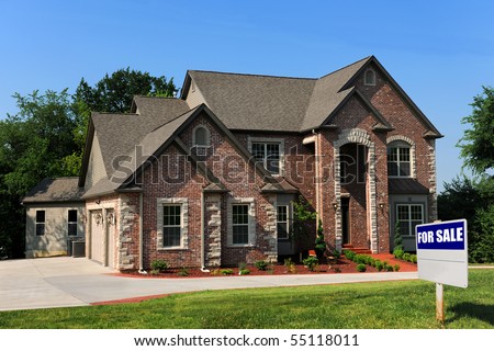 New house for sale with sign on front yard
