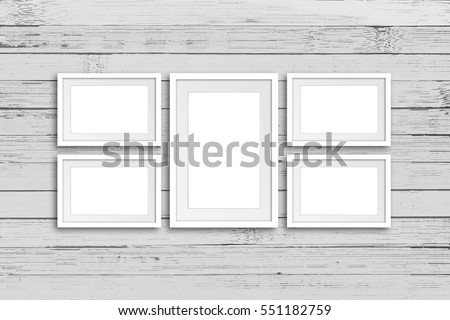 Collage of five frames on old white painted wooden panels wall, office style, decor mock up