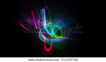 Abstract line motion of different colors, curves abstraction color explosion. Unrecognizable figure. Expressive sketch on a black background isolated