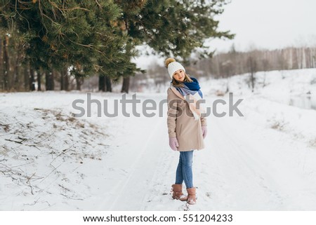 Amazing girl in the winter forest