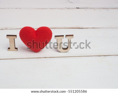 Valentine festival , New year concept  . Red heart and letter love  on wood background for create idea copy space.