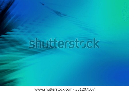 Abstract palm tree silhouette in motion. Dynamic pattern, blurred leaves moving in wind, for creative concept business blog, nature t-shirt design shop, water diving sports. Image with filter effect