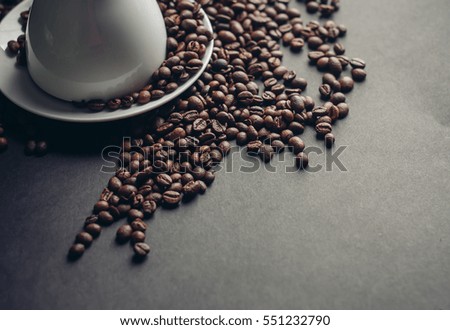 Coffee mug with coffee beans