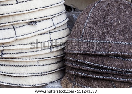 Bunch of handmade colorful woolen hats