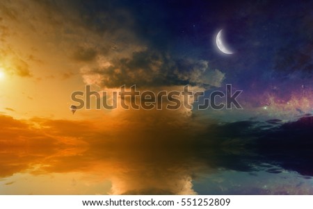 Amazing fantastic picture - hot air balloon in glowing sunset sky with rising new moon and mushroom like cloud, seascape with reflection in sea.  Elements of this image furnished by NASA