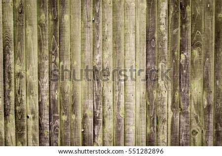 Wooden grunge, old, aged background lighting by the Sun