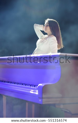 the woman with the white piano
