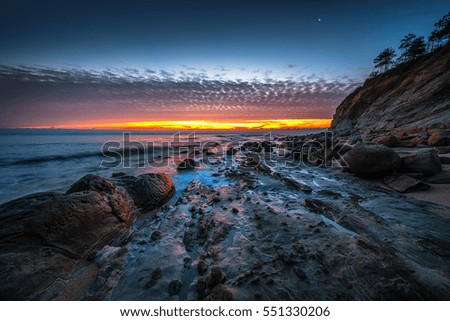 Beautiful cloudscape over the sea, sunrise shot
