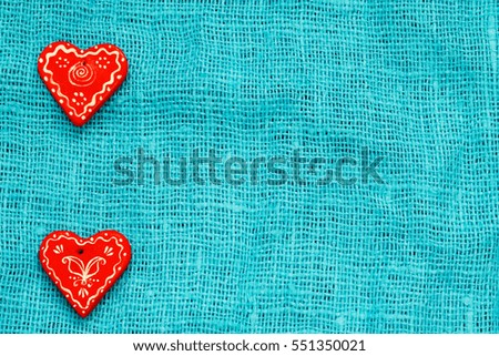 two red heart on a turquoise background St. Valentine's Day
