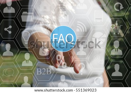 Businesswoman presses the FAQ button on the touch screen .  