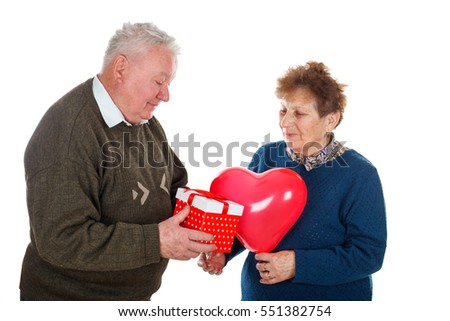 Picture of an old couple celebrating anniversary - isolated background