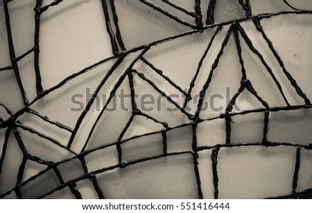 Abstract vitrage on glass. Hand drown painting on glass.Black and white  ornaments