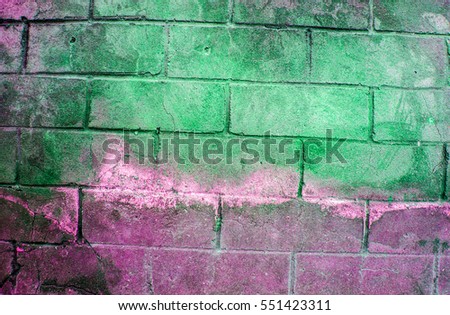 Fragment of old dirty brick wall with peeling plaster texture white grey green violet, stone surface with cracks, useful as background toned