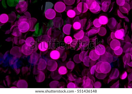 Abstract circular bokeh background of pink holiday lights