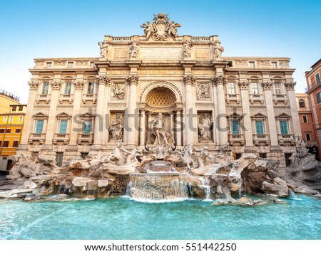 Trevi fountain at sunrise, Rome, Italy, Europe. Rome baroque architecture and landmark. Rome Trevi fountain is one of the main attractions of Rome and Italy Royalty-Free Stock Photo #551442250