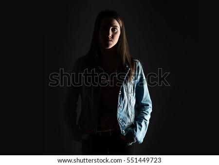 Young girl posing in studio