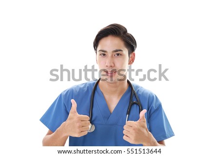 Doctor showing thumbs up sign