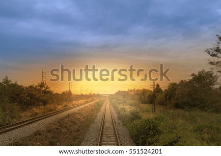railroad goes to horizon in sunset