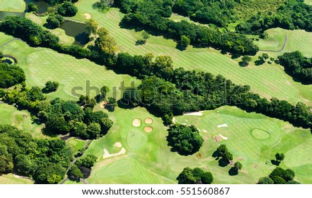 Aerial picture of Golf course next to the turquoise lagoon of Mauritius Island