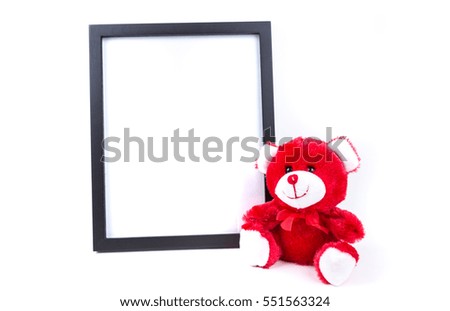 Valentine bear with a black picture frame isolated on a white background