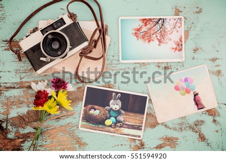 Photo album in remembrance and nostalgia of Happy easter day in spring on wood table. instant photo of vintage camera - vintage and retro style