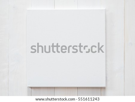 White blank canvas mockup square size on white wood wall for arts painting and photo hanging interior decoration