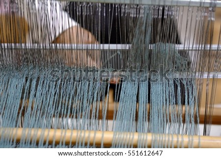 Weaving work.
Hand-woven.
