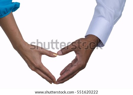 Close up of doctor's hands making heart shape on white background