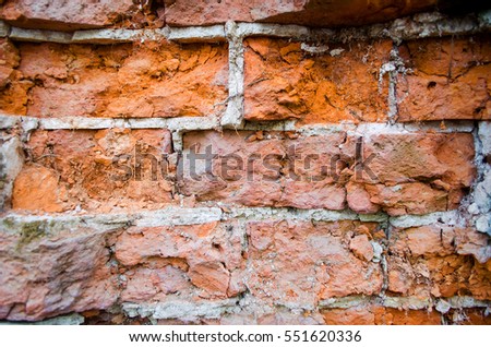 Wall with red bricks.
Old brick wall paid close. Background image