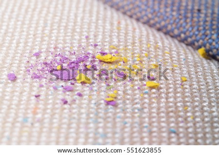 Close up picture of bright colorful powder on gunny textile. Concept photo for easy clean surfaces