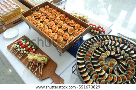 Catering - people group catering buffet food indoor in luxury restaurant with meat colorful fruits and vegetables
