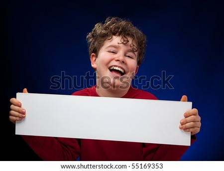Boy holding blank board