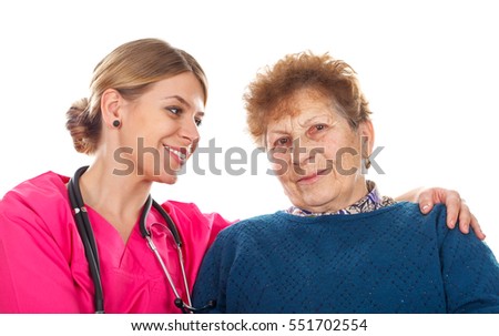Picture of an elderly woman with her assistant