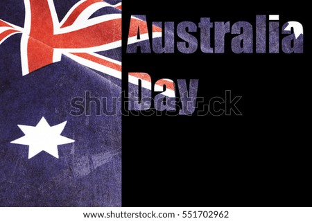 Australia Day text cut out over photo of Australian flag with applied grunge filters. 