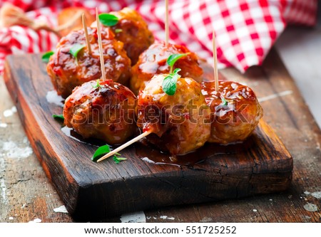 Chicken Meatballs with glaze.selective focus.rustic style Royalty-Free Stock Photo #551725252