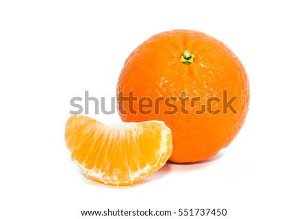 Two mandarin isolated on a white background. The symbol of the holiday season. Royalty-Free Stock Photo #551737450