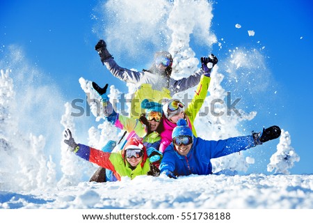 Group happy friends having fun at Sheregesh ski resort. Skiers and snowboarders team concept